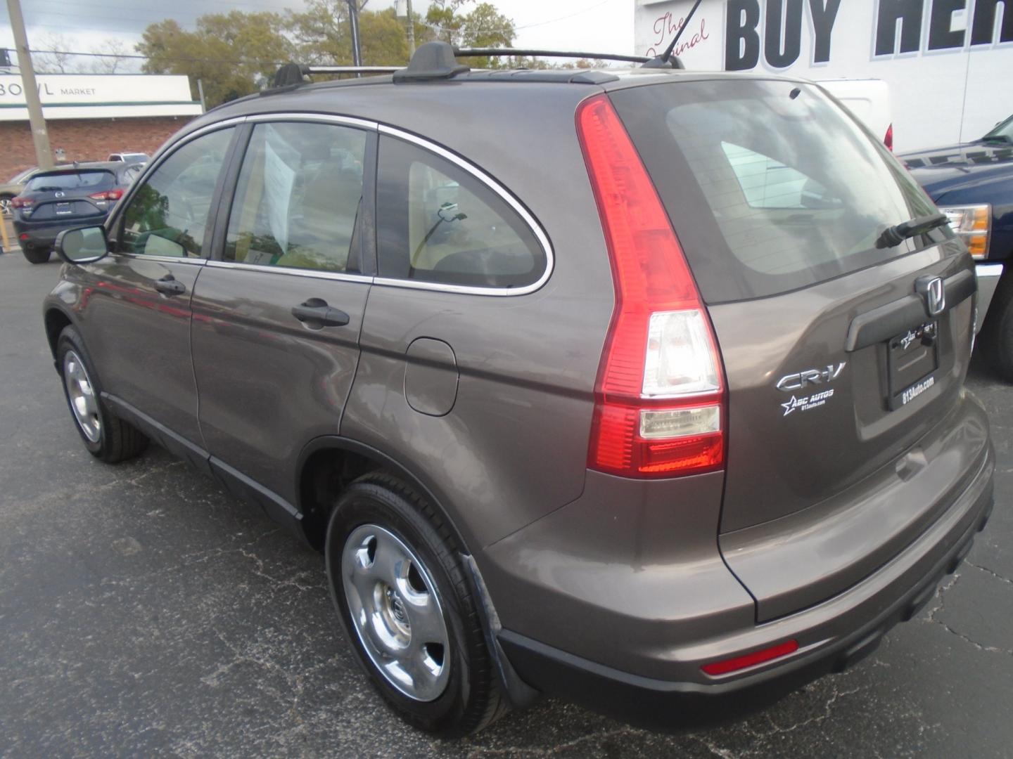 2011 GRAY HONDA CR-V (3CZRE3H34BG) with an L4 2.4L engine, CVT transmission, located at 6112 N Florida Avenue, Tampa, FL, 33604, (888) 521-5131, 27.954929, -82.459534 - Photo#4